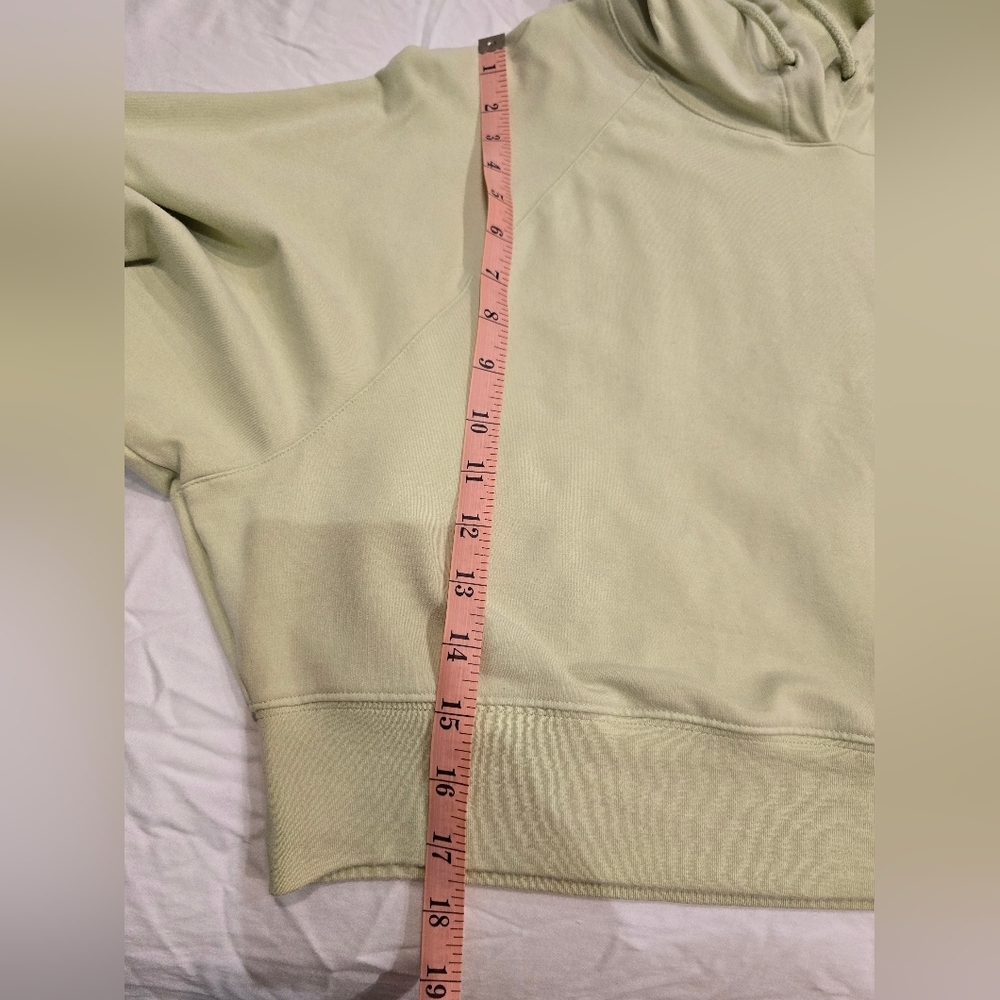 Alo Yoga Cropped Double Take French Terry Hoodie in the color Iced Green Tea - Picture 6 of 7